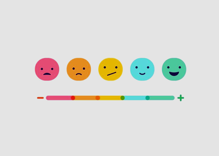 A linear scale of emoji faces from sad in red to happy in green